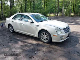2008 Cadillac STS RWD z VIN 1G6DZ67A980209793, wystawiony jako IAAI lot #42399289 z przebiegiem 175 341 mil mil oraz . Historia ofert i sprzedaży dostępna na DreamBid. Obrazek 1.