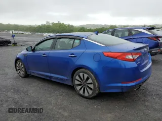 2011 Kia Optima SX z VIN KNAGR4A6XB5109812, wystawiony jako Copart lot #57073075 z przebiegiem 157 953 mil mil oraz Czysty tytuł • Clean title. Historia ofert i sprzedaży dostępna na DreamBid. Obrazek 2.