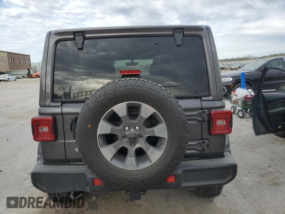 2018 Jeep Wrangler Unlimited Sahara with VIN 1C4HJXEG0JW303941, listed as a Copart auction lot 53029895 with 43,419 mi miles and Salvage title. Bid and sale history available at DreamBid. Image 6.