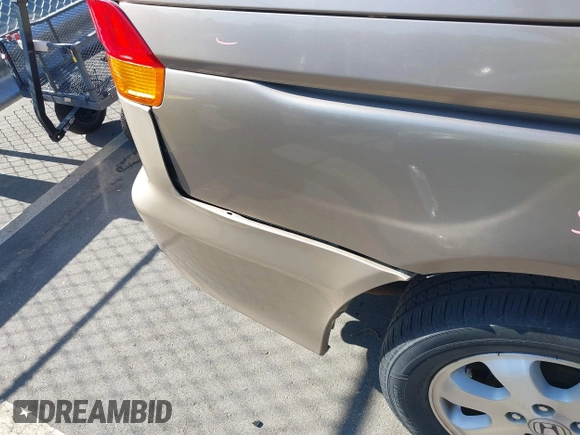 2004 Honda Odyssey EX-L with VIN 5FNRL18044B072819, listed as a IAAI auction lot 42441279 with 264,950 mi miles and . Bid and sale history available at DreamBid. Image 13.