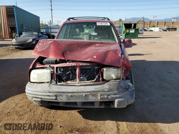 2001 Chevrolet Tracker LT z VIN 2CNBJ634716945832, wystawiony jako Copart lot #61967345 z przebiegiem 136 403 mil mil oraz Szkoda całkowita • Salvage title. Historia ofert i sprzedaży dostępna na DreamBid. Obrazek 5.