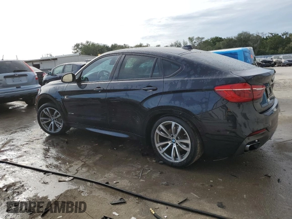 2015 BMW X6 xDrive50i with VIN 5UXKU6C56F0F93641, listed as a Copart auction lot 77233553 with 71,409 mi miles. Bid and sale history available at carsss.com. Image 2.