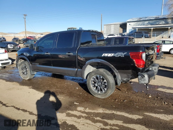 2017 Nissan Titan SV with VIN 1N6AA1E59HN509950, listed as a Copart auction lot 42231085 with 143,746 mi miles and Salvage Title. Bid and sale history available at DreamBid. Image 2.