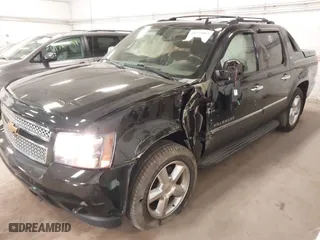2012 Chevrolet Avalanche LTZ with VIN 3GNTKGE7XCG151943, listed as a IAAI auction lot 41774003 with 123,512 mi miles. Bid and sale history available at carsss.com. Image 6.
