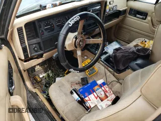 1994 Jeep Cherokee Sport with VIN 1J4FT68S0RL177339, listed as a Copart auction lot 47237805 with 207,156 mi miles and Salvage Title. Bid and sale history available at carsss.com. Image 8.