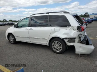 2010 Toyota Sienna XLE с VIN 5TDDK4CC5AS029985, выставлен на аукционе Copart как лот 84182164 с пробегом 232 460 миль миль и Списание • Salvage title. История ставок и продаж доступна на DreamBid. Изображение 2.