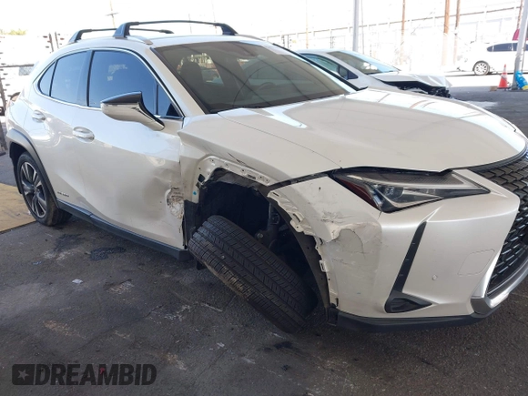 2022 Lexus UX 250h with VIN JTHX9JBH5N2054854, listed as a IAAI auction lot 42009922 with 57,944 mi miles and . Bid and sale history available at DreamBid. Image 6.