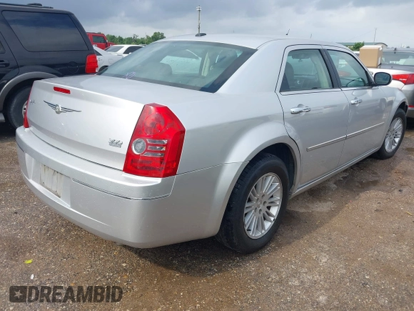 2010 Chrysler 300 Touring with VIN 2C3CA5CV1AH272993, listed as a IAAI auction lot 42154073 with 224,685 mi miles and . Bid and sale history available at DreamBid. Image 4.