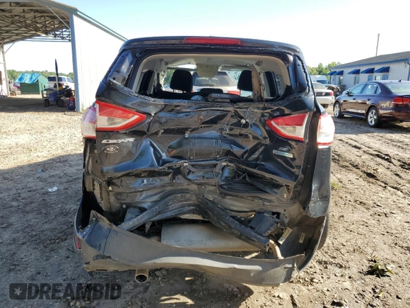 2013 Ford Escape SE with VIN 1FMCU0GX9DUA16048, listed as a Copart auction lot 57780915 with Not provided miles and Salvage title. Bid and sale history available at DreamBid. Image 6.