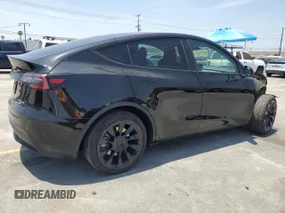 2024 Tesla Model Y Long Range with VIN 7SAYGDEEXRA253111, listed as a Copart auction lot 60929295 with 16,423 mi miles and Salvage title. Bid and sale history available at DreamBid. Image 3.