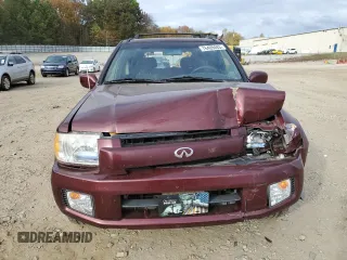 2002 Infiniti QX4 Luxury z VIN JNRDR09Y32W251563, wystawiony jako Copart lot #76409483 z przebiegiem 118 273 mil mil oraz Szkody całkowita. Historia ofert i sprzedaży dostępna na DreamBid. Obrazek 5.