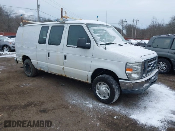 2011 Ford Econoline Cargo Commercial with VIN 1FTNE1EWXBDA35585, listed as a IAAI auction lot 41349320 with 122,311 mi miles and . Bid and sale history available at carsss.com. Image 1.