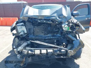 2017 Toyota Tacoma SR5 with VIN 3TMCZ5AN0HM098367, listed as a IAAI auction lot 42299298 with 69,770 mi miles and . Bid and sale history available at DreamBid. Image 6.