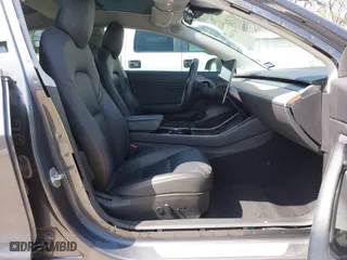 2018 Tesla Model 3 Long Range Battery with VIN 5YJ3E1EA4JF157782, listed as a IAAI auction lot 41774169 with 123,239 mi miles. Bid and sale history available at carsss.com. Image 5.
