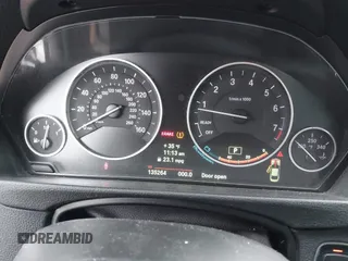 2014 BMW 4 Series 428i xDrive with VIN WBA3N5C53EF716542, listed as a IAAI auction lot 41157641 with 135,264 mi miles and . Bid and sale history available at DreamBid. Image 7.