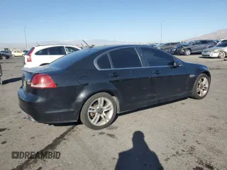 2009 Pontiac G8 z VIN 6G2ER57769L215137, wystawiony jako Copart lot #52262665 z przebiegiem 174 574 mil mil oraz Czysty tytuł • Clean title. Historia ofert i sprzedaży dostępna na DreamBid. Obrazek 3.
