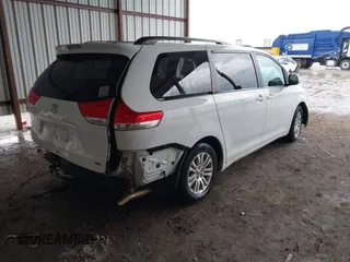 2014 Toyota Sienna XLE with VIN 5TDYK3DC6ES444121, listed as a IAAI auction lot 42110190 with 240,366 mi miles and . Bid and sale history available at DreamBid. Image 4.