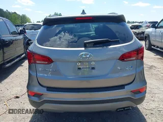 2017 Hyundai Santa Fe Ultimate z VIN 5NMZW4LA7HH047989, wystawiony jako IAAI lot #42051500 z przebiegiem 75 747 mil mil oraz . Historia ofert i sprzedaży dostępna na DreamBid. Obrazek 16.