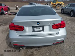 2018 BMW 3 Series 330i with VIN WBA8B9C59JEE81184, listed as a IAAI auction lot 41806952 with Not provided miles and . Bid and sale history available at DreamBid. Image 16.