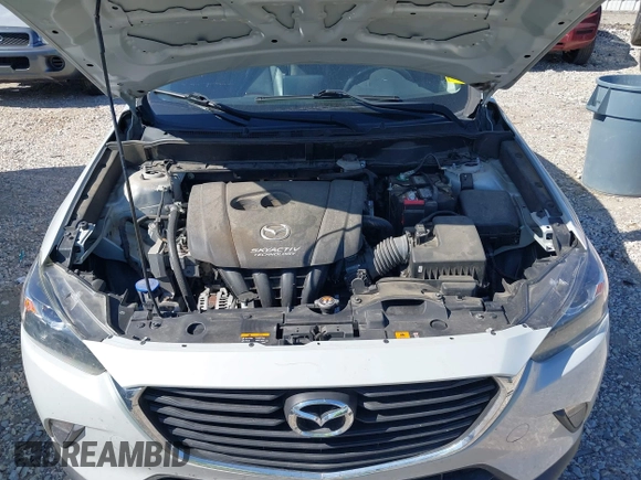 2018 Mazda CX-3 Touring z VIN JM1DKFC77J0331828, wystawiony jako IAAI lot #40482555 z przebiegiem 101 473 mil mil oraz . Historia ofert i sprzedaży dostępna na DreamBid. Obrazek 10.