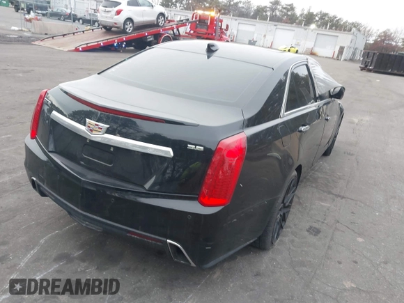 2019 Cadillac CTS Luxury RWD with VIN 1G6AR5SS2K0100788, listed as a IAAI auction lot 41515814 with 70,799 mi miles and . Bid and sale history available at DreamBid. Image 4.