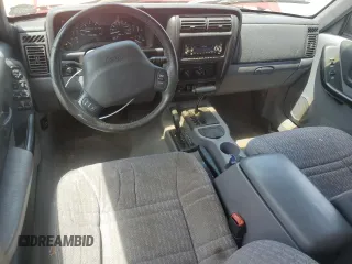 1998 Jeep Cherokee Sport with VIN 1J4FJ68S2WL285432, listed as a Copart auction lot 57183145 with 284,162 mi miles and Clean title. Bid and sale history available at DreamBid. Image 8.