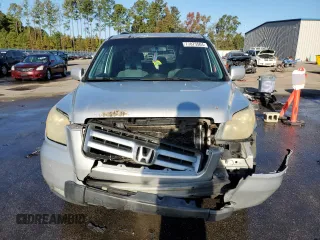 2006 Honda Pilot EX with VIN 5FNYF28446B008729, listed as a Copart auction lot 77075504 with 356,586 mi miles and Salvage Title. Bid and sale history available at DreamBid. Image 5.