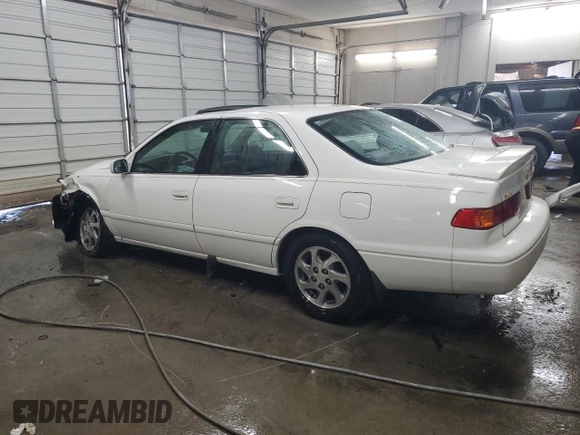 2000 Toyota Camry CE with VIN 4T1BG22K7YU996749, listed as a Copart auction lot 41957205 with 197,160 mi miles and Salvage Title. Bid and sale history available at carsss.com. Image 2.