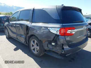 2018 Honda Odyssey EX-L z VIN 5FNRL6H7XJB067694, wystawiony jako IAAI lot #42177338 z przebiegiem 159 670 mil mil oraz . Historia ofert i sprzedaży dostępna na DreamBid. Obrazek 3.