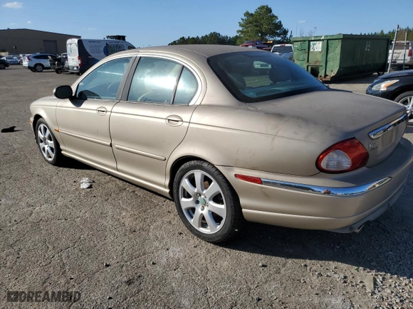 2005 Jaguar X-Type 3.0L with VIN SAJWA51A55WE56452, listed as a Copart auction lot 77010044 with NaN miles and Clean Title. Bid and sale history available at carsss.com. Image 2.
