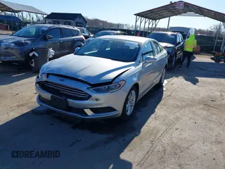 2018 Ford Fusion SE with VIN 3FA6P0LU1JR272522, listed as a IAAI auction lot 41796432 with 123,471 mi miles and . Bid and sale history available at DreamBid. Image 2.
