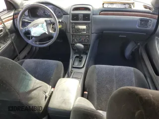 2000 Toyota Solara SE with VIN 2T1CG22P0YC277702, listed as a Copart auction lot 47311565 with 371,789 mi miles and Salvage Title. Bid and sale history available at carsss.com. Image 8.