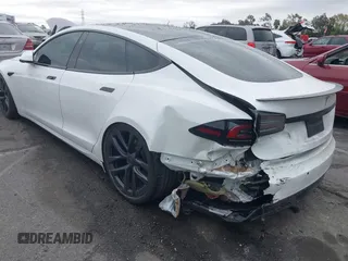 2022 Tesla Model S Plaid with VIN 5YJSA1E65NF488864, listed as a IAAI auction lot 41772788 with 33,915 mi miles and . Bid and sale history available at DreamBid. Image 3.