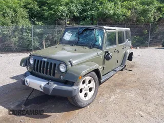 2015 Jeep Wrangler Unlimited Altitude z VIN 1C4HJWEG0FL752152, wystawiony jako IAAI lot #42311043 z przebiegiem 112 379 mil mil oraz . Historia ofert i sprzedaży dostępna na DreamBid. Obrazek 19.