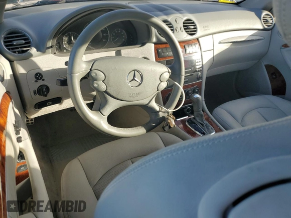 2005 Mercedes-Benz CLK-Class 3.2L with VIN WDBTK65J45F134556, listed as a Copart auction lot 74143204 with 61,131 mi miles and Salvage Title. Bid and sale history available at carsss.com. Image 8.