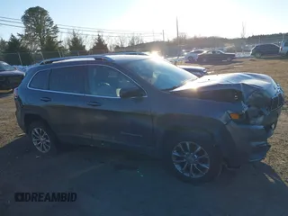 2019 Jeep Cherokee Altitude with VIN 1C4PJMLN0KD213357, listed as a IAAI auction lot 41320886 with 136,506 mi miles. Bid and sale history available at carsss.com. Image 13.