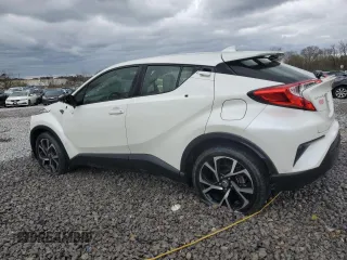 2018 Toyota C-HR XLE z VIN JTNKHMBXXJ1003871, wystawiony jako Copart lot #49984355 z przebiegiem 101 395 mil mil oraz Szkoda całkowita • Salvage title. Historia ofert i sprzedaży dostępna na DreamBid. Obrazek 2.