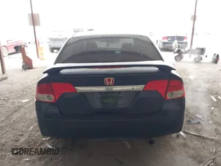 2009 Honda Civic LX z VIN 2HGFA16559H505476, wystawiony jako IAAI lot #41619635 z przebiegiem 187 084 mil mil oraz . Historia ofert i sprzedaży dostępna na DreamBid. Obrazek 16.