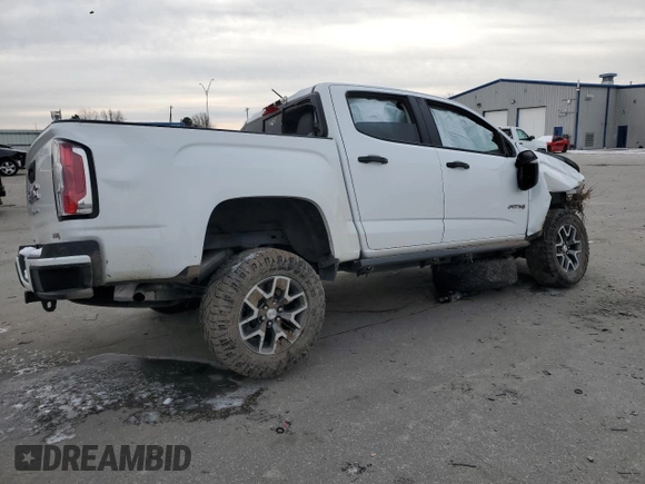 2022 GMC Canyon 4WD AT4 w/Cloth with VIN 1GTG6FEN5N1155598, listed as a Copart auction lot 41970495 with 57,572 mi miles and Salvage Title. Bid and sale history available at carsss.com. Image 3.