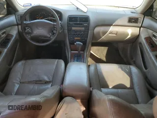 1997 Lexus ES 300 Luxury Sport Sdn with VIN JT8BF22G0V0048360, listed as a Copart auction lot 77594284 with 104,072 mi miles and Salvage Title. Bid and sale history available at carsss.com. Image 8.