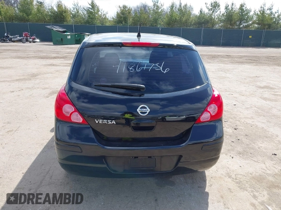 2012 Nissan Versa S with VIN 3N1BC1CP9CK290446, listed as a IAAI auction lot 41861756 with 124,883 mi miles. Bid and sale history available at carsss.com. Image 16.