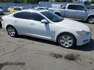 2011 Jaguar XF with VIN SAJWA0FB6BLR86959, listed as a Copart auction lot 52579385 with 110,087 mi miles and Salvage Title. Bid and sale history available at carsss.com. Image 4.