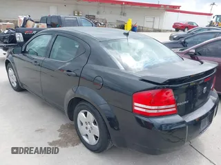 2009 Dodge Avenger SE with VIN 1B3LC46B89N502258, listed as a IAAI auction lot 42132545 with 142,305 mi miles and . Bid and sale history available at carsss.com. Image 3.