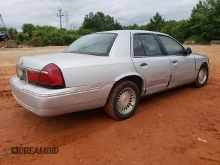1999 Mercury Grand Marquis LS z VIN 2MEFM75W3XX617388, wystawiony jako Copart lot #58811195 z przebiegiem 162 600 mil mil oraz Szkoda całkowita • Salvage title. Historia ofert i sprzedaży dostępna na DreamBid. Obrazek 3.