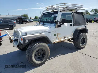 1999 Jeep Wrangler Sport with VIN 1J4FY19SXXP464096, listed as a Copart auction lot 61233105 with 167,350 mi miles and Clean title. Bid and sale history available at DreamBid. Image 1.