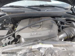 2011 Jeep Grand Cherokee Laredo with VIN 1J4RR4GGXBC506728, listed as a IAAI auction lot 41889334 with 236,099 mi miles. Bid and sale history available at carsss.com. Image 10.