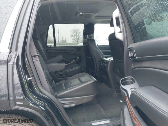 2016 Chevrolet Tahoe LTZ with VIN 1GNSKCKC2GR104305, listed as a IAAI auction lot 41697868 with 124,670 mi miles. Bid and sale history available at carsss.com. Image 8.