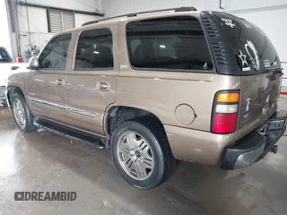 2004 GMC Yukon SLT with VIN 1GKEK13Z84R265500, listed as a IAAI auction lot 41412544 with 259,575 mi miles. Bid and sale history available at carsss.com. Image 3.