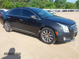 2013 Cadillac XTS Premium with VIN 2G61S5S34D9127996, listed as a IAAI auction lot 41978539 with 185,157 mi miles. Bid and sale history available at carsss.com. Image 1.