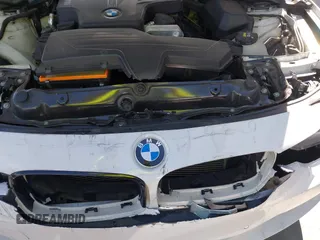 2015 BMW 3 Series 320i with VIN WBA3B1G56FNT06434, listed as a IAAI auction lot 41772918 with 76,782 mi miles. Bid and sale history available at carsss.com. Image 6.